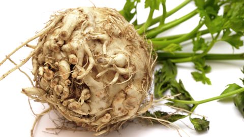 No, don't toss it out. This unappetizing root is an excellent <a href="http://www.fruitsandveggiesmorematters.org/celeriac-nutrition-selection-storage" target="_blank" target="_blank">source</a> of vitamins C and K, and it has no fat or cholesterol. It also is a good way to get some manganese, potassium, phosphorous and -- what else -- fiber into your diet.  Make roasted celery root "chips," grate it raw into a salad, or do the old-fashioned mash. It pairs well with apples or potatoes. The nutty flavor of cooked celery root also complements fish dishes.