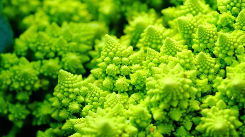 A cross between broccoli and cauliflower, this crazy "moonscape" veggie is lighter and sweeter than both of its parents. Fat-, cholesterol- and sodium-free, broccoflowers are an excellent <a href="index.php?page=&url=http%3A%2F%2Fwww.fruitsandveggiesmorematters.org%2Fbroccoflower" target="_blank" target="_blank">source</a> of vitamin C, and the unusual chartreuse color adds a visual punch to many dishes.
