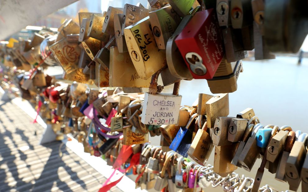 MAY 18 -- MELBOURNE, AUSTRALIA: The padlocks now seen on bridges around the world to commemorate a couple's love, has come to an end in Australia's second largest city. The council plan to remove 20,000 "lover's locks" because their weight is affecting the safety of Southgate footbridge.