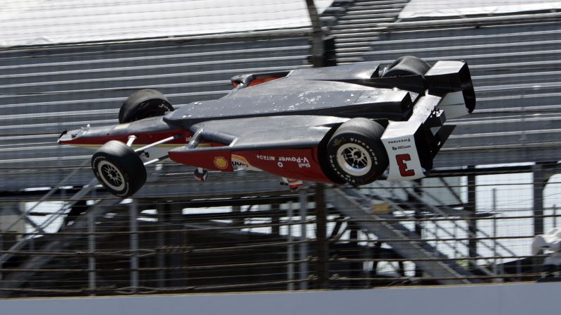 The car driven by Helio Castroneves goes airborne Wednesday, May 13, during a practice run for the Indianapolis 500. Castroneves was not hurt in the wreck. "I just brushed the wall, and unfortunately the car just took off," <a href="index.php?page=&url=http%3A%2F%2Fwww.cnn.com%2F2015%2F05%2F15%2Fmotorsport%2Fcastroneves-indy-500-crash-motorsport%2F" target="_blank">the Brazilian told CNN.</a>