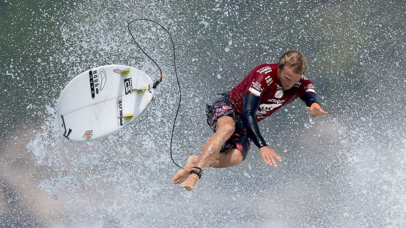 Australian surfer Josh Kerr is separated from his board while competing in Rio de Janeiro on Friday, May 15.