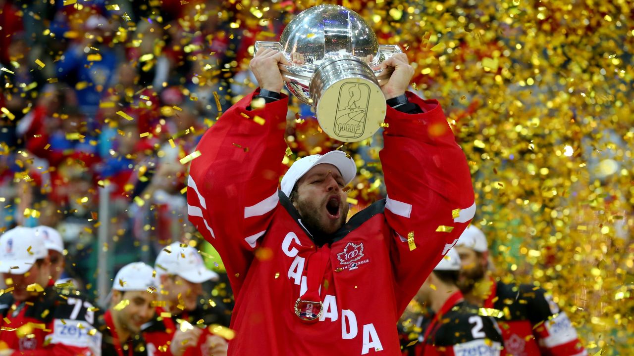 Goalie Mike Smith lifts the trophy Sunday, May 17, after Canada defeated Russia 6-1 in the gold-medal match of the Ice Hockey World Championship. The tournament was held in the Czech Republic.