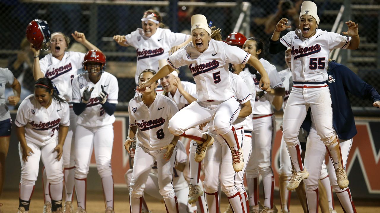 Arizona's softball team celebrates a game-tying home run by Chelsea Goodacre during an NCAA tournament game Sunday, May 17, in Tucson, Arizona. The Wildcats advanced to the next stage of the tournament by defeating Minnesota 7-6 in eight innings.