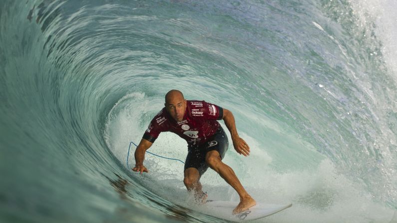 American surfer Kelly Slater ducks under a wave during a competition in Rio de Janeiro on Tuesday, May 12.