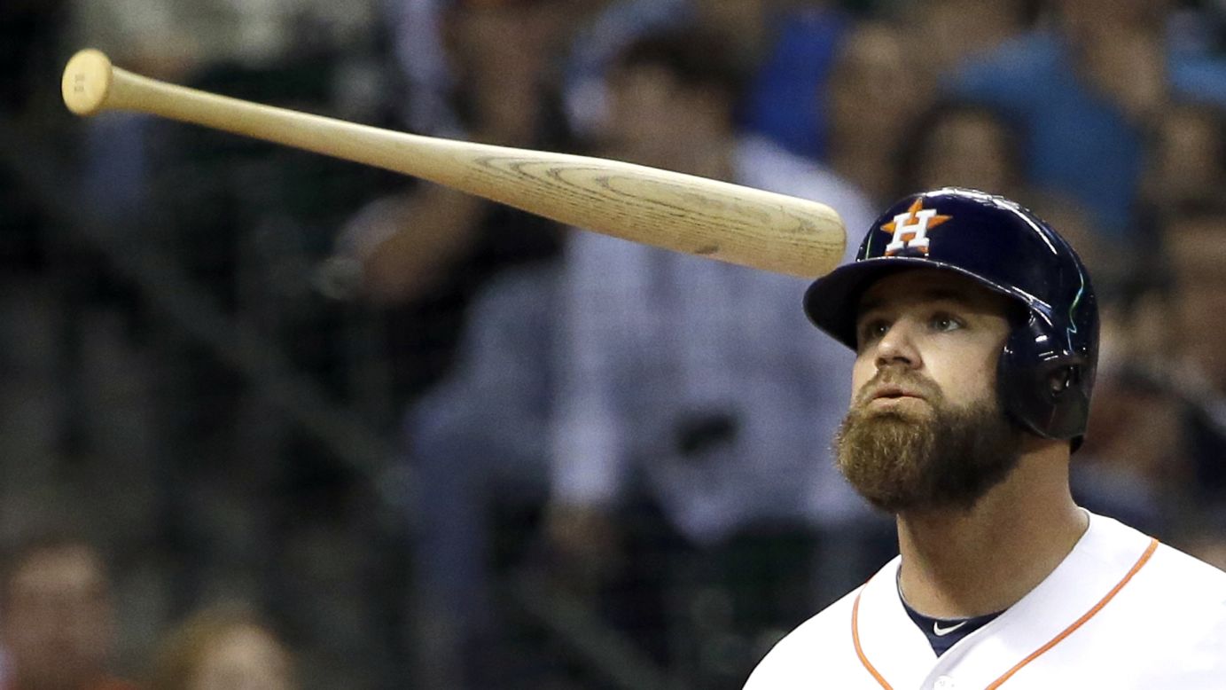 Houston's Evan Gattis tosses his bat after striking out Wednesday, May 13, in a home game against the San Francisco Giants.