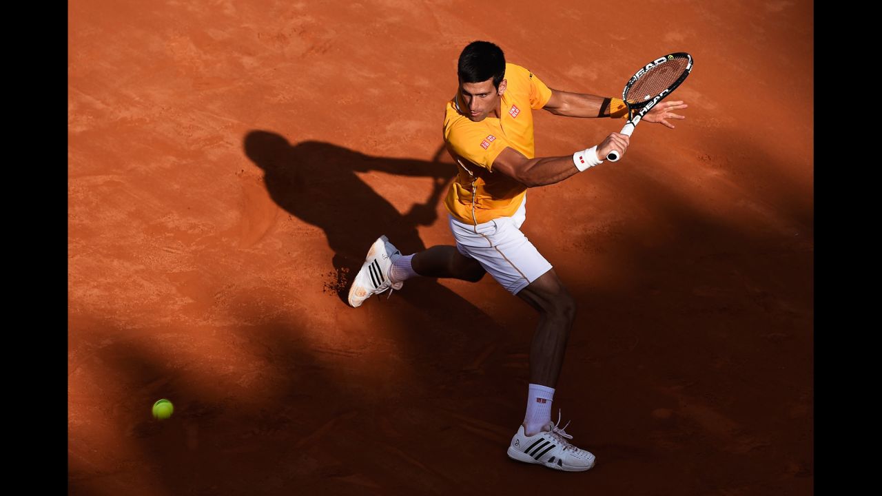 Novak Djokovic prepares to hit a backhand during the final of the Italian Open on Sunday, May 17. Djokovic, the top-ranked player in the world, defeated Roger Federer in straight sets. 