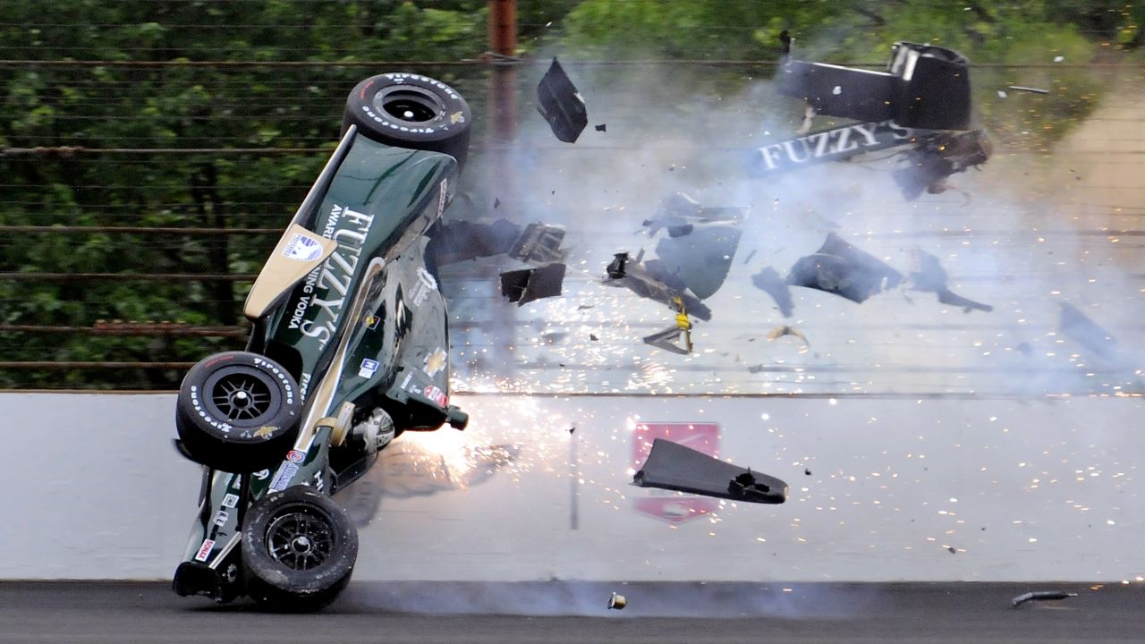 Ed Carpenter hits the wall Sunday, May 17, during a practice run for the Indianapolis 500. Carpenter walked away from the crash and was released from the track hospital.