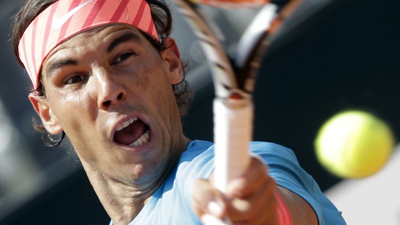 Rafael Nadal returns a shot during a second-round match at the Italian Open on Wednesday, May 13.