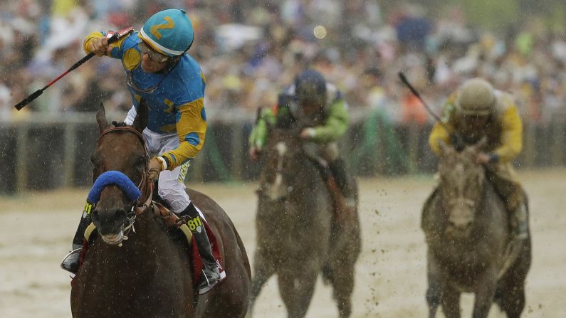American Pharoah, ridden by Victor Espinoza, wins the Preakness Stakes in Baltimore on Saturday, May 16. American Pharoah would become the 12th horse in history to <a href="index.php?page=&url=http%3A%2F%2Fwww.cnn.com%2F2012%2F06%2F07%2Fworldsport%2Fgallery%2Ftriple-crown-winners%2Find">win the Triple Crown</a> -- and the first since 1978 -- if he wins the Belmont Stakes on Saturday, June 6.
