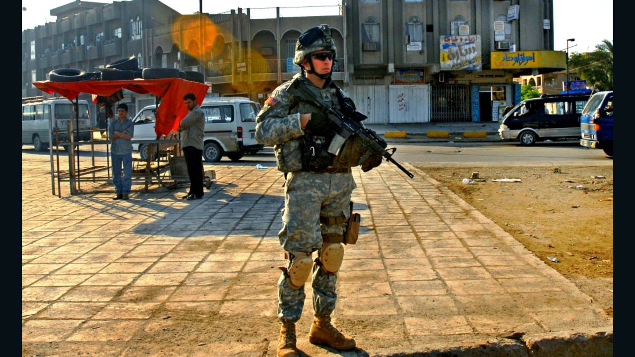 Murphy patrols in the Sadr City area of Baghdad, Iraq, in an undated photo.