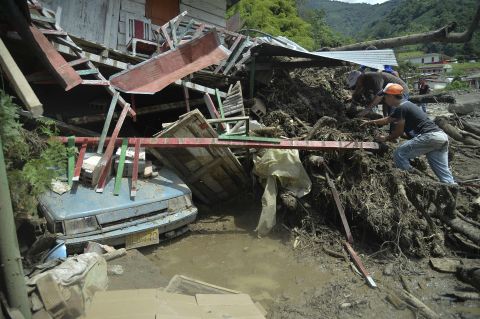 People search for relatives after the landslide.