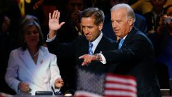 Vice presidential nominee Sen. Joe Biden walks with his son, Delaware Attorney General Beau Biden, at the Democratic National Convention at the Pepsi Center in Denver, Colorado on August 27, 2008.