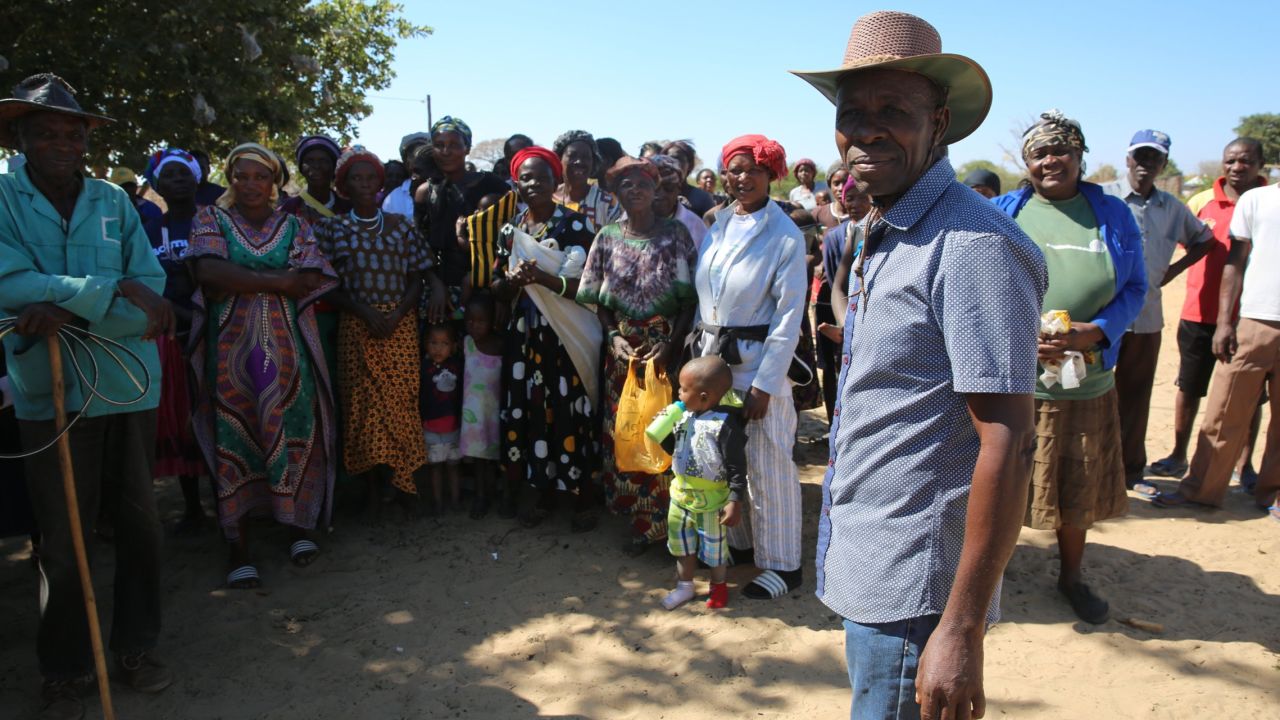 A crowd gathered when Knowlton and his professional hunting guide arrived at the spot where the village elder announced the gift.