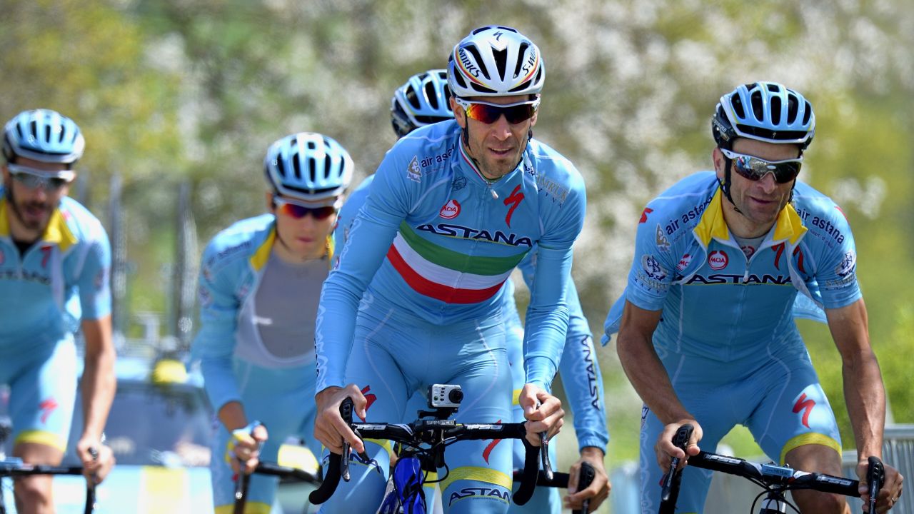 Italy's Vincenzo Nibali (C) and his teammates of the Kazakhstan's Astana Pro cycling team, climb the La Redoute hill, on April 24, 2015 in Aywaille, two days before the one day cycling race Liege-Bastogne-Liege. Tour de France champion Vincenzo Nibali is free to defend his title in July after his Astana team was allowed to keep its racing licence despite a series of doping shocks, the UCI governing body announced on April 23, 2015.
