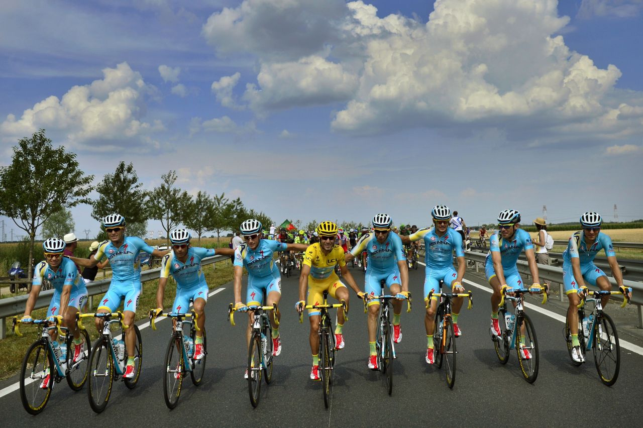 Nibali (center in yellow) started the 2014 season with confidence after winning the Giro D'Italia in his first year at the Kazakh team. 