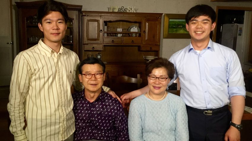 The Yang family's sons refuse to report for compulsory military service because of their religious beliefs. Yang Won-wuk (left) served more than a year in prison. Yang Won-suk (right) is appealing his sentence.