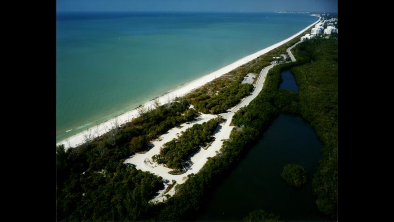 <strong>2. Barefoot Beach Preserve County Park, Bonita Springs, Florida. </strong>Between Fort Myers and Naples on Florida's Gulf Coast,<a href="http://www.colliergov.net/Index.aspx?page=455#preserve" target="_blank" target="_blank"> this 8,200-foot-long beach</a> is tucked into a 342-acre preserve.  The shallow waters, gentle surf and seashells make it ideal for families with young children. The habitat also hosts sea turtle nesting sites during the summer. The protected gopher tortoise also calls the preserve home. 