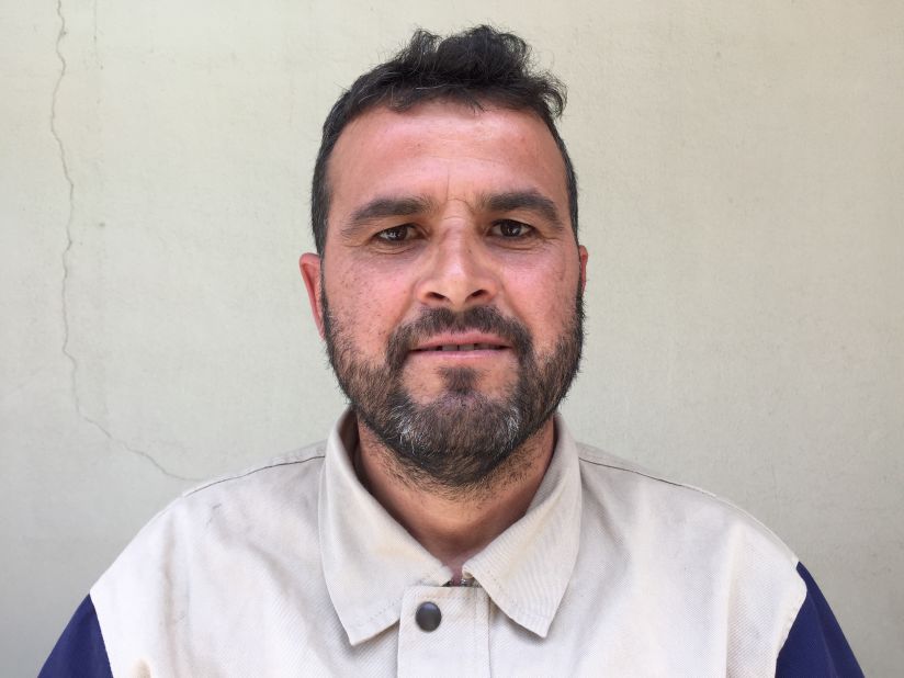 Ahmad Khaleel, 47. Former military. "I responded, along with my team, to a thermobaric missile and barrel bombs. Three two-story buildings next to each other were destroyed. 22 people were killed, but I am proud that we were able to pull 6 people out alive, especially the children."
