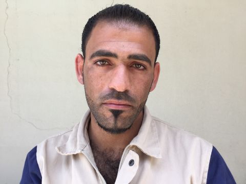 Husam Mudiratee, 27. Policeman. "A two-story building collapsed. We found an 11-year-old boy crouched in the corner, safe. It was the first life I rescued and if I never save another life, that will be enough."
