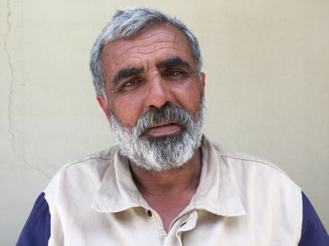 Ali Hubeter, 49. Farmer. "We found two kids in the rubble in Ainsheeb. The two-year-old lost his leg. We thought he wouldn't make it, but he is alive!"
