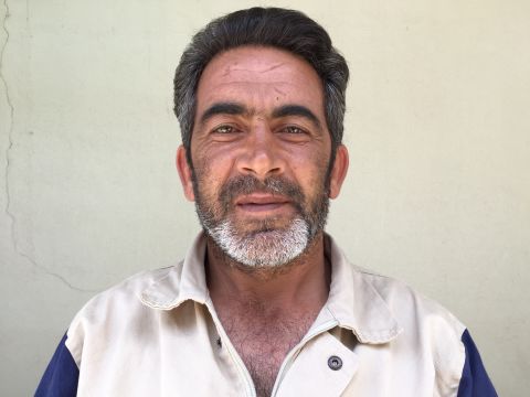 Mohammad Ata Rashwani, 44. Hospital administration. "We were in a village called Kastim and rescued a man whose entire lower half was buried. A missile hit a car outside the shop he was in. We took him to the hospital and he lived." Mohammad joined the White Helmets five days after his son was killed working the very same job.