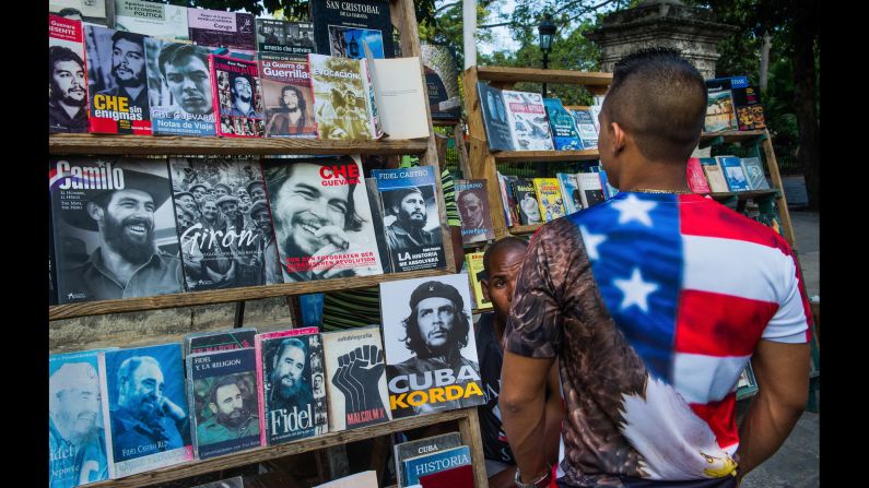 A man looks at a magazine stand in Havana in January.