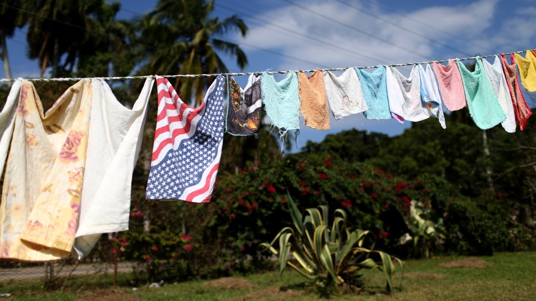 A handkerchief in the colors of the American flag hangs on a clothesline in Havana in February.