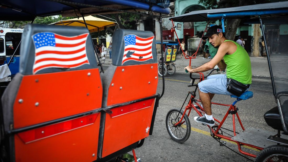 American flags adorn a pedicab in Havana in January.