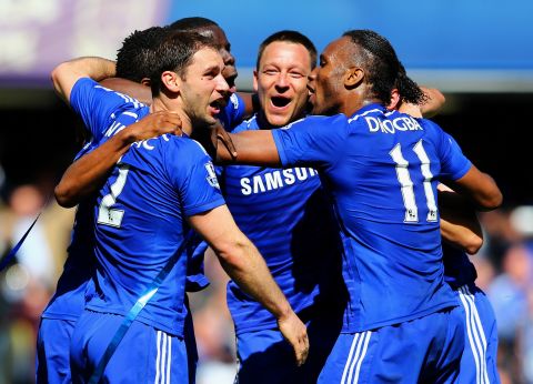 Chelsea's players celebrating after securing the 2014-15 EPL title with a 1-0 home win over Crystal Palace.