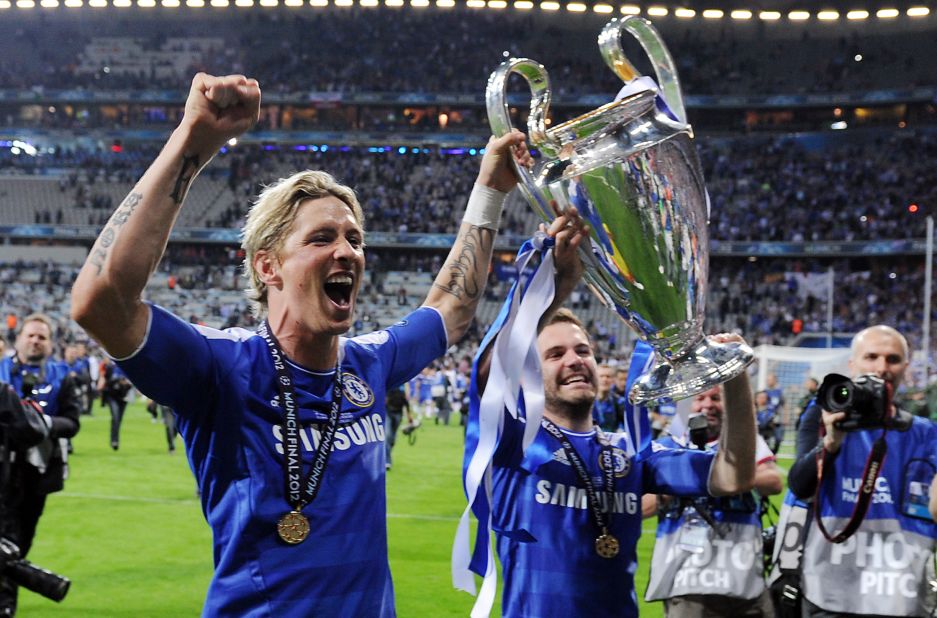The match finished 1-1 after extra-time, with striker Didier Drogba scoring the winning penalty in the shootout. Here, Spaniards Fernando Torres (left) and Juan Mata celebrate with the trophy. Both have since left the club.