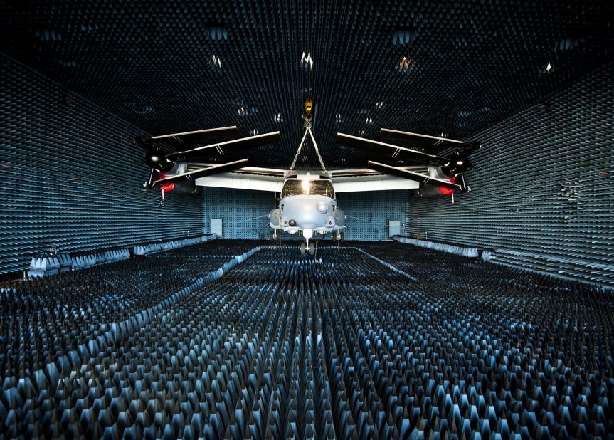 A CV-22 Osprey, flown by the Air Force's 8th Special Operations Squadron, hangs in an anechoic chamber at the Joint Preflight Integration of Munitions and Electronic Systems hangar at Eglin Air Force Base, Florida, in 2012. 