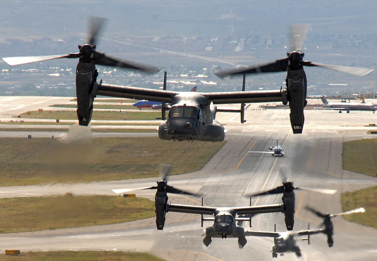Air Force CV-22 Ospreys take off from Kirtland Air Force Base, New Mexico, for a training mission. The Osprey is a tilt-rotor aircraft that combines the vertical takeoff, hover and landing qualities of a helicopter with the normal flight characteristics of a turboprop aircraft.  Click through to see Ospreys in action.