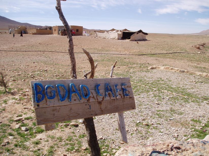 A sign hangs on the side of the road toward Palmyra, which is a UNESCO World Heritage Site. 