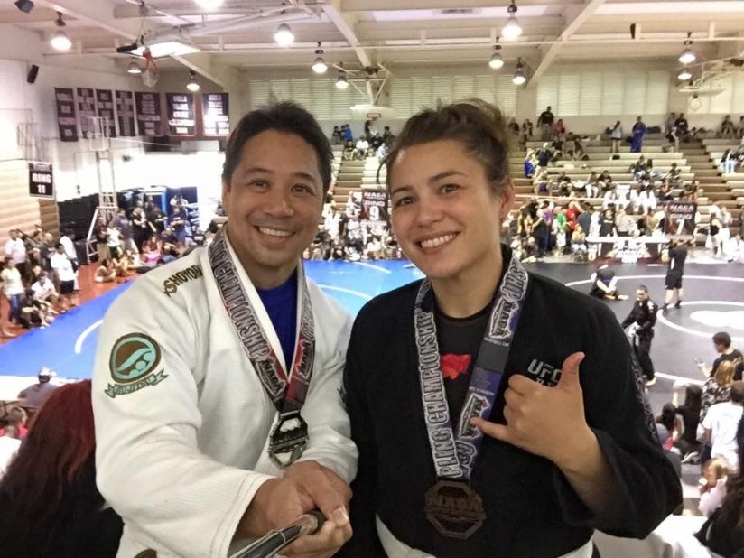 Jiujitsu Bronze medalist Michelle Anthony (right) with her boyfriend. After years of crippling fear, she now feels confident because of her decision to take classes in jiujitsu.