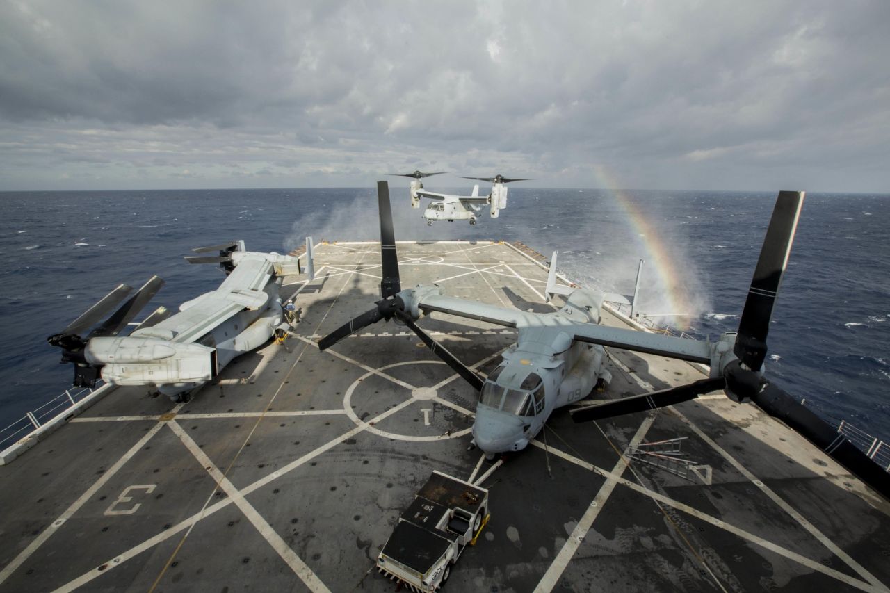 An MV-22B Osprey, assigned to Marine Medium Tiltrotor Squadron 365 (Reinforced), 24th Marine Expeditionary Unit, hovers over the flight deck of the amphibious transport dock USS New York, at sea, in January 2015.