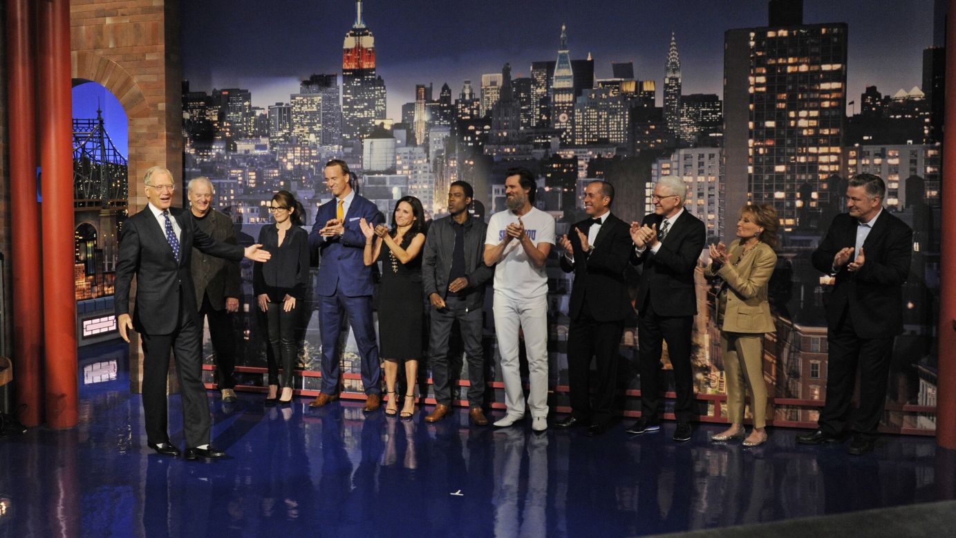 Celebrities help retiring talk-show host David Letterman, left, present the Top 10 list Wednesday, May 20, <a href="http://money.cnn.com/2015/05/20/media/david-letterman-goodbye-late-show/" target="_blank">during his final "Late Show" episode.</a> Behind Letterman, from left to right, are Bill Murray, Tina Fey, Peyton Manning, Julia Louis-Dreyfus, Chris Rock, Jim Carrey, Jerry Seinfeld, Steve Martin, Barbara Walters and Alec Baldwin.