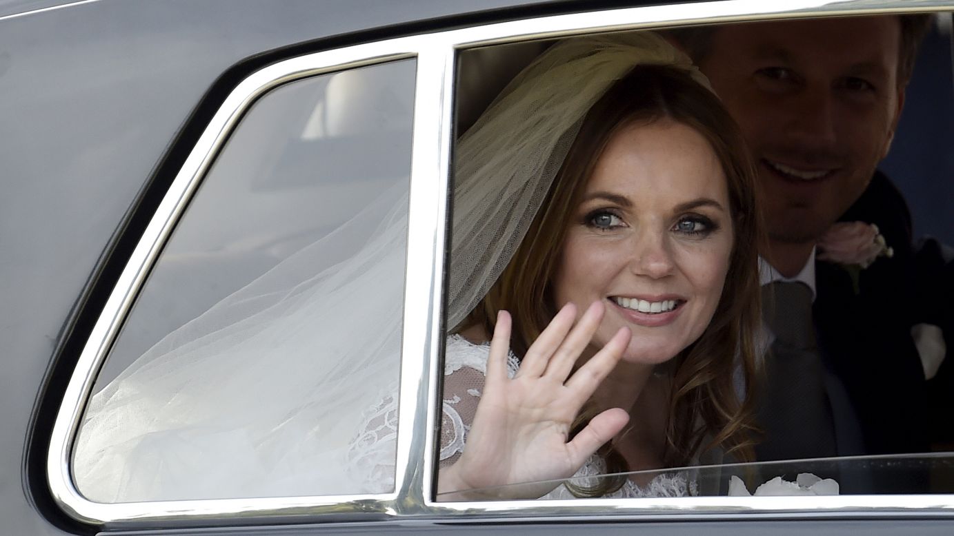 Singer Geri Halliwell, a former member of the Spice Girls, waves Friday, May 15, after marrying Christian Horner in Woburn, England. Horner is principal of the Red Bull Formula One racing team.