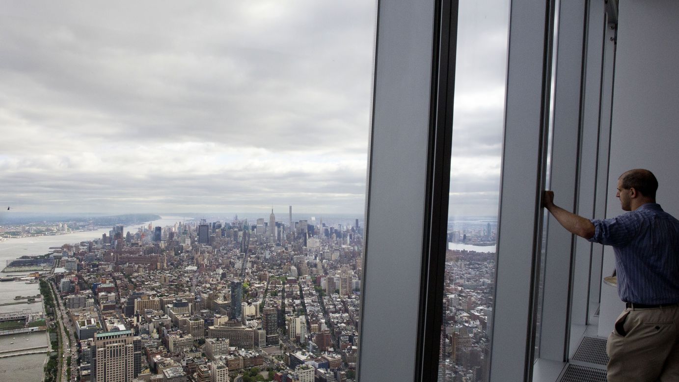 A visitor at the One World Observatory looks over the New York borough of Manhattan on Wednesday, May 20. The observatory, atop the One World Trade Center, opens to the public on May 29. <a href="http://www.cnn.com/2015/05/15/world/gallery/week-in-photos-0515/index.html" target="_blank">See last week in 35 photos</a>