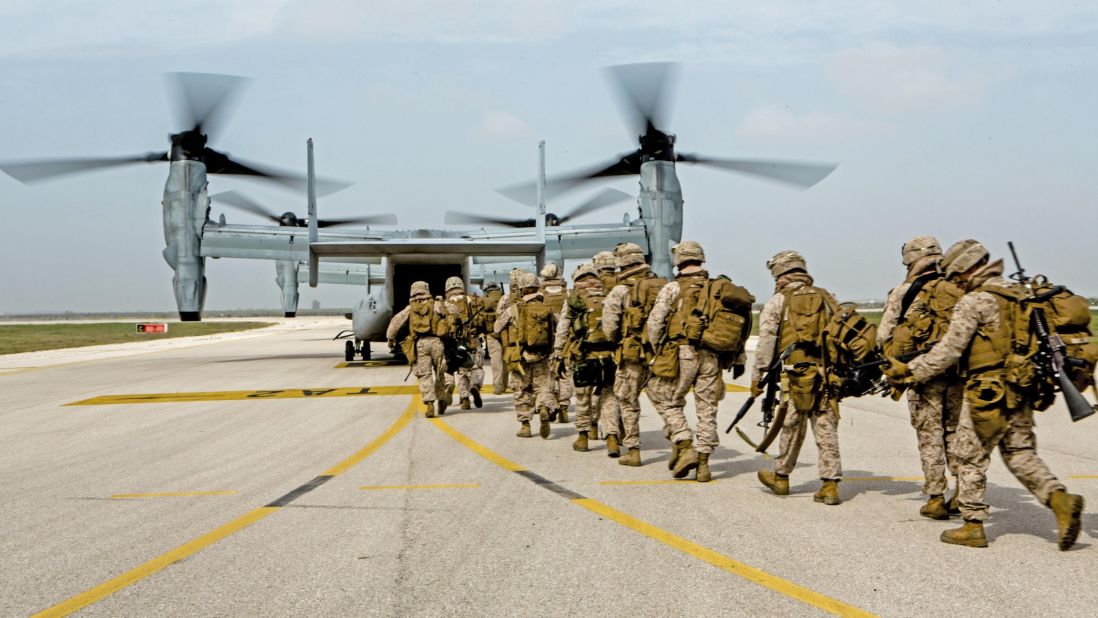 U.S. Marines with Special-Purpose Marine Air-Ground Task Force Crisis Response-Africa board an MV-22 Osprey during an alert force drill at Moron Air Base, Spain, on March 13, 2015. The alert force tested its capabilities by simulating a reaction to a real-time crisis response mission by flying to Sigonella, Italy, on a moment's notice. 