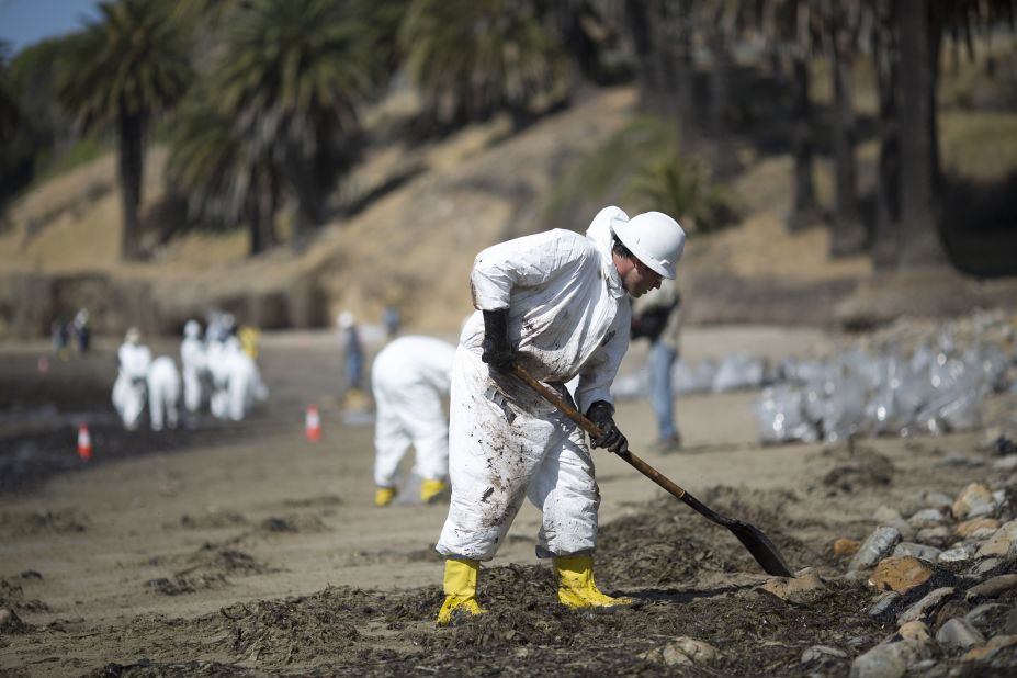 Crews clean up oil on May 20.