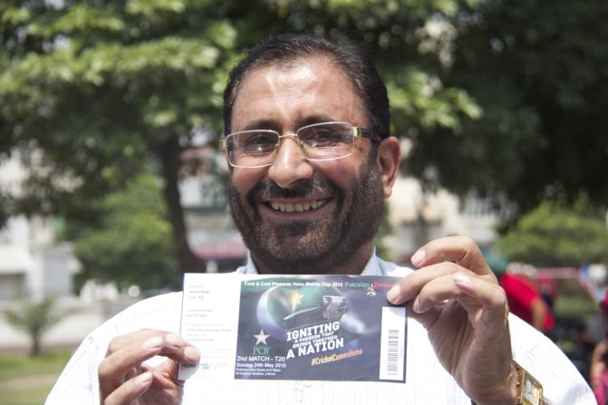 Pakistan is expected to go into overdrive Friday as the Pakistani cricket team will play on its home turf for the first time in almost a decade. Here, Khan Muhammad cheerfully brandishes the ticket he bought with his friend for the match -- which is completely sold out.