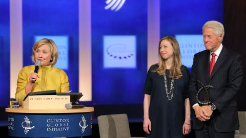 Former U.S. Secretary of State Hillary Clinton, vice-chair of the Clinton Global Initiative Chelsea Clinton and founder of the Clinton Global Initiative Bill Clinton onstage during the fourth day of the Clinton Global Initiative's 10th Annual Meeting at the Sheraton New York Hotel & Towers on September 24, 2014 in New York City. 