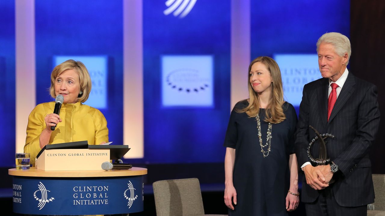 Former U.S. Secretary of State Hillary Clinton, vice-chair of the Clinton Global Initiative Chelsea Clinton and founder of the Clinton Global Initiative Bill Clinton onstage during the fourth day of the Clinton Global Initiative's 10th Annual Meeting at the Sheraton New York Hotel & Towers on September 24, 2014 in New York City.
