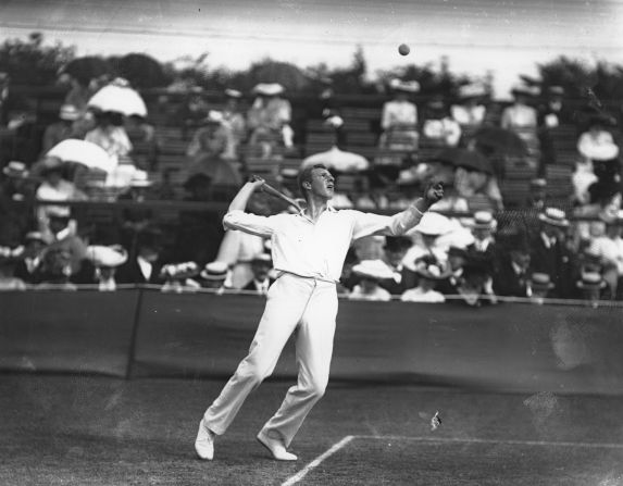 Tony Wilding of New Zealand serves during the 1908 Wimbledon Championships, played at the club's original Worple Road home. 