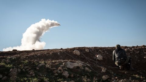 Rebels launch a missile near the Abu Baker brigade in Al-Bab, Syria, on January 16, 2013.