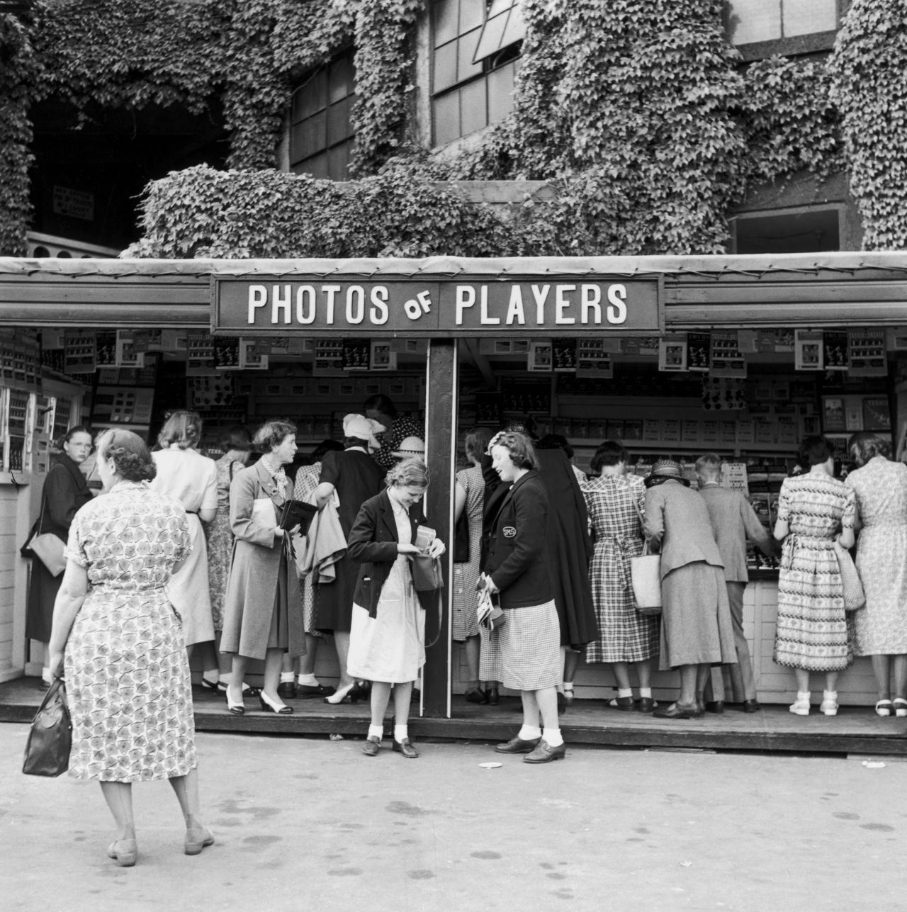 Fans buy photographs of their favorite players at a shop in the grounds of Wimbledon in 1951.