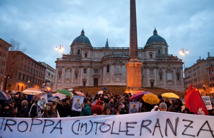 But many stood in solidarity with the migrants in Rosarno. Here, protesters from anti-racism associations hold banners during a solidarity demonstration with immigrant workers in front of Italy's Interior Ministry in Rome.
