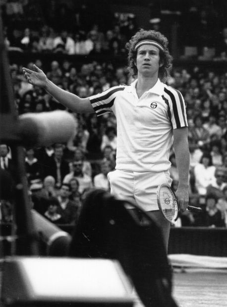 John McEnroe disputes the umpire's call in front of a packed Centre Court in 1980.