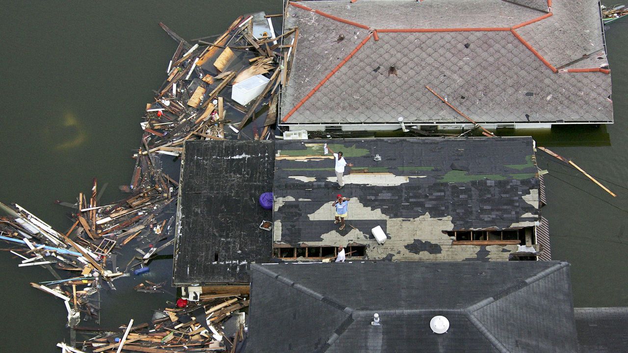 <strong>Katrina, 2005:</strong> Unforgettable <a href="http://www.nhc.noaa.gov/data/tcr/AL122005_Katrina.pdf" target="_blank" target="_blank">Katrina</a> -- the costliest hurricane and one of the five deadliest to hit the United States, according to NOAA -- devastated the Gulf Coast days after crossing Florida. Flooding destroyed thousands of homes in the New Orleans area alone; storm surges wiped out coastal towns in Mississippi. Here, people stand stranded on a roof in New Orleans.