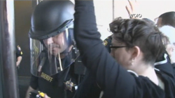 police block protesters Michael Brelo verdict